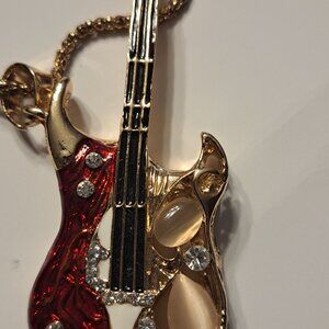 vintage guitar necklace
